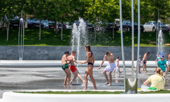 Children pour water at the fountain - Ukraine, Odessa, 11,06,2020