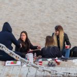 Young people drink alcohol on the beach - Ukraine, Odessa, 11,06,2020