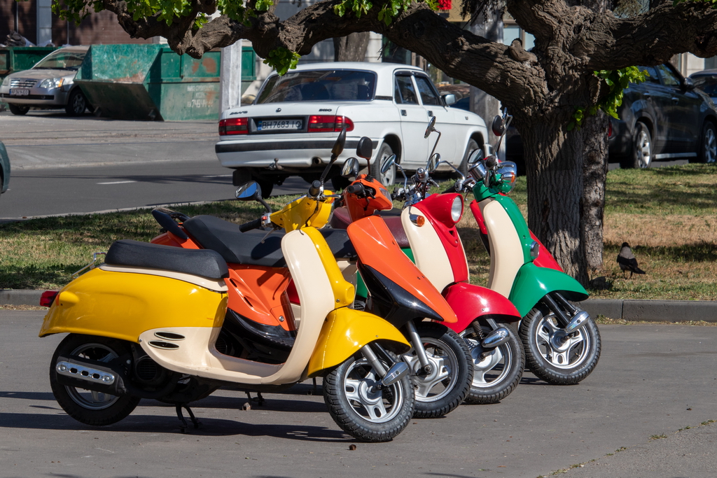 Several multi-colored mopeds - Ukraine, Odessa, 11,06,2020
