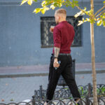 Man with cross tattoo and alcohol on the street - Ukraine, Odessa, 27.09,2020