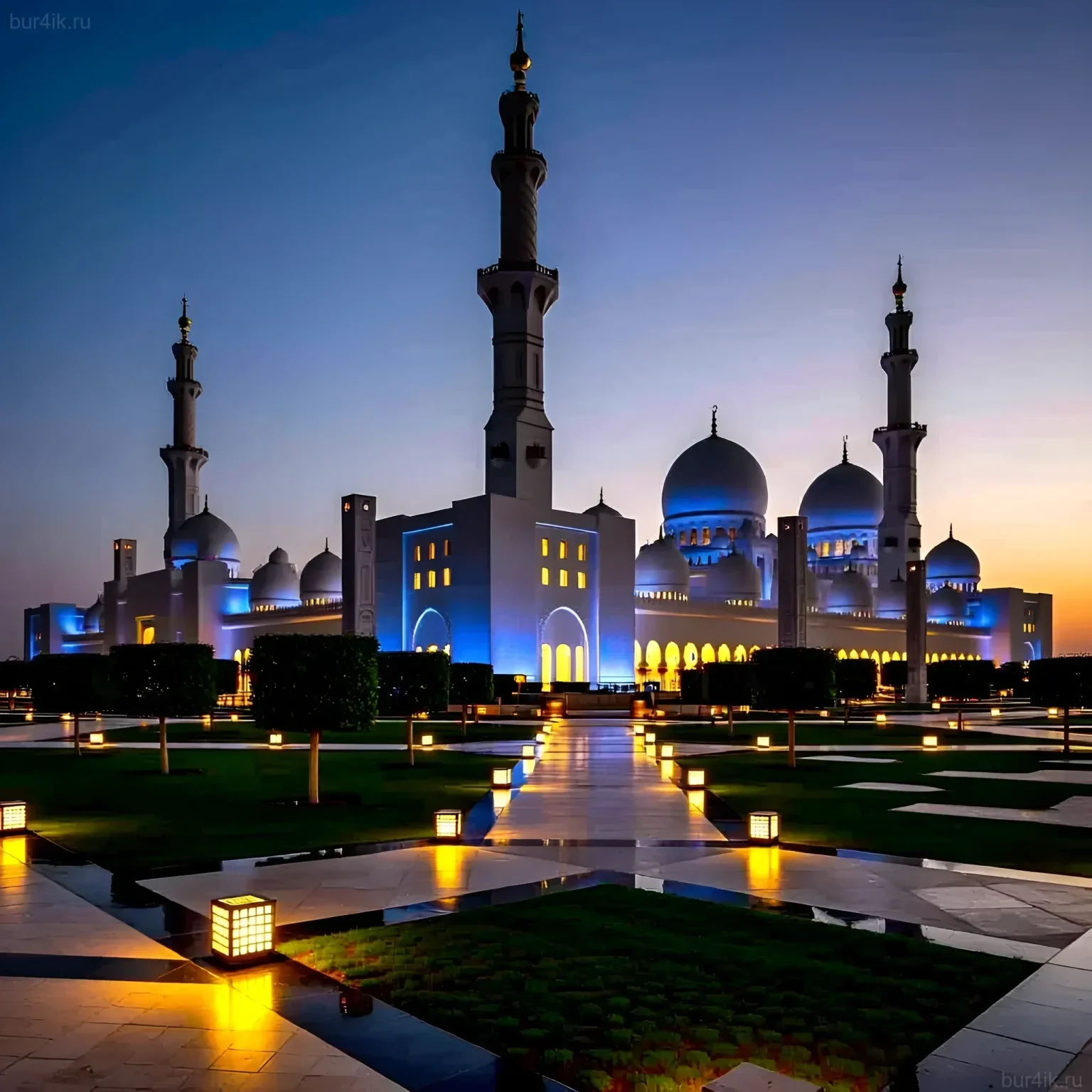 Величественная мечеть шейха Зайда в Абу-Даби, подсвеченная в сумерках. Идеальное фото для вдохновения путешествий по ОАЭ и мусульманским странам.